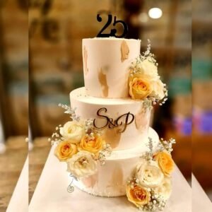 golden-peach-monogram-milestone-cake