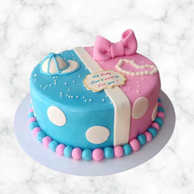 polka-dot-fondant-baby-shower-cake-with-bow-and-cap